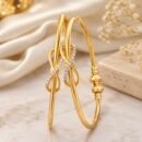 Infinity Bow Gold Plated Adjustable Bracelet for Women with CZ Stones